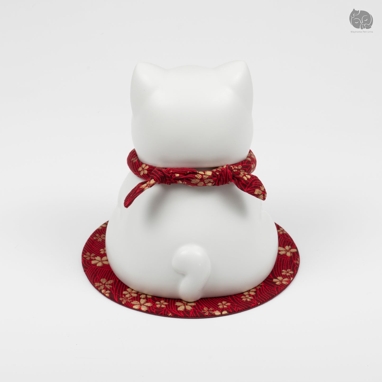 Rear view of the cat ceramic urn, showing the cute tail detail and secure handcrafted ceramic base.