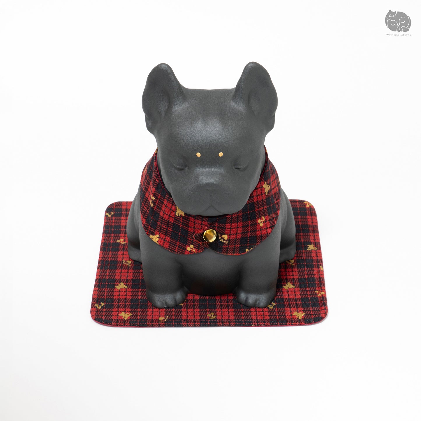 Slightly top-down front view of the Wayhome bulldog urn, showing the golden eye details.