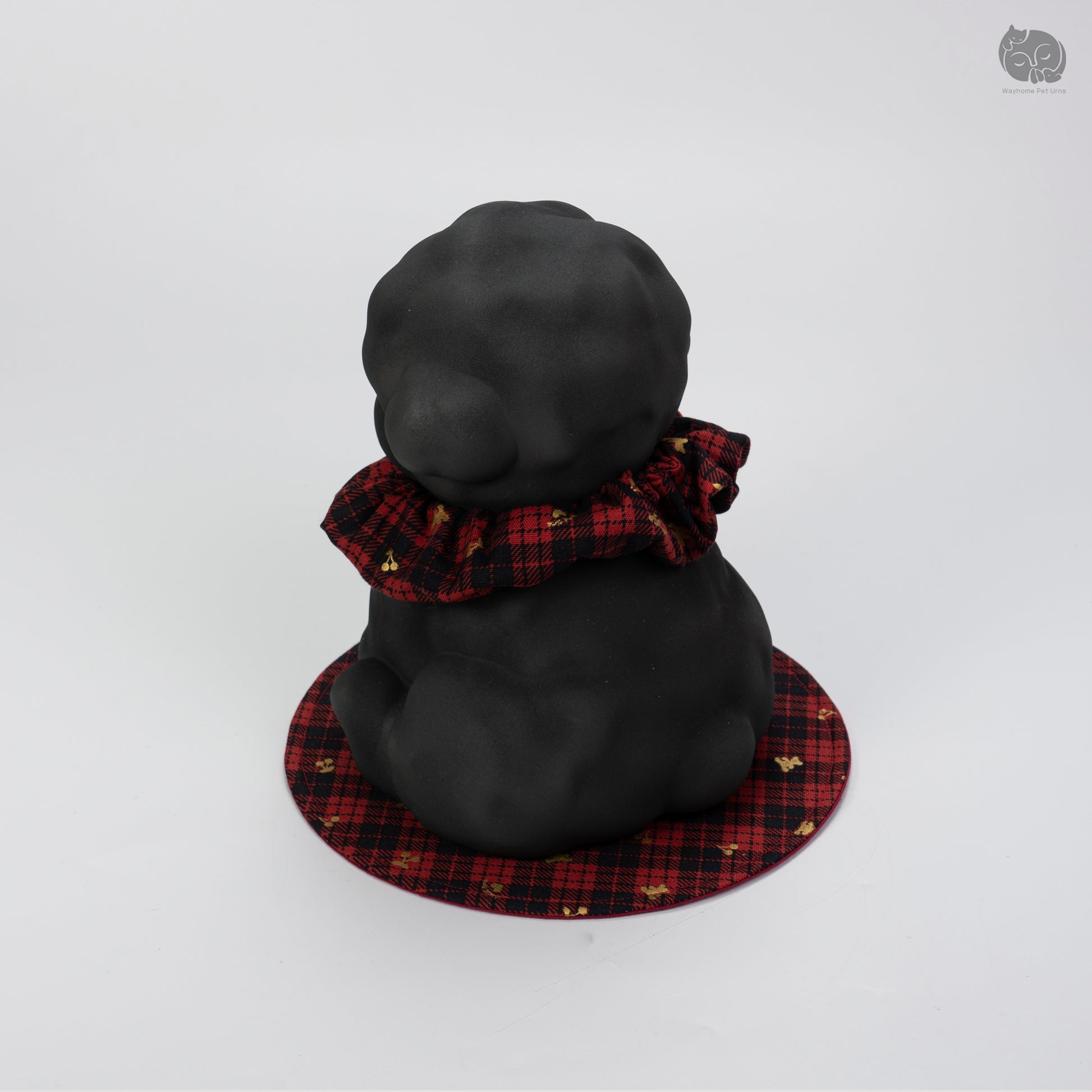 Angled rear profile of the obsidian black dog memorial keepsake, designed for small breeds like Bichon.