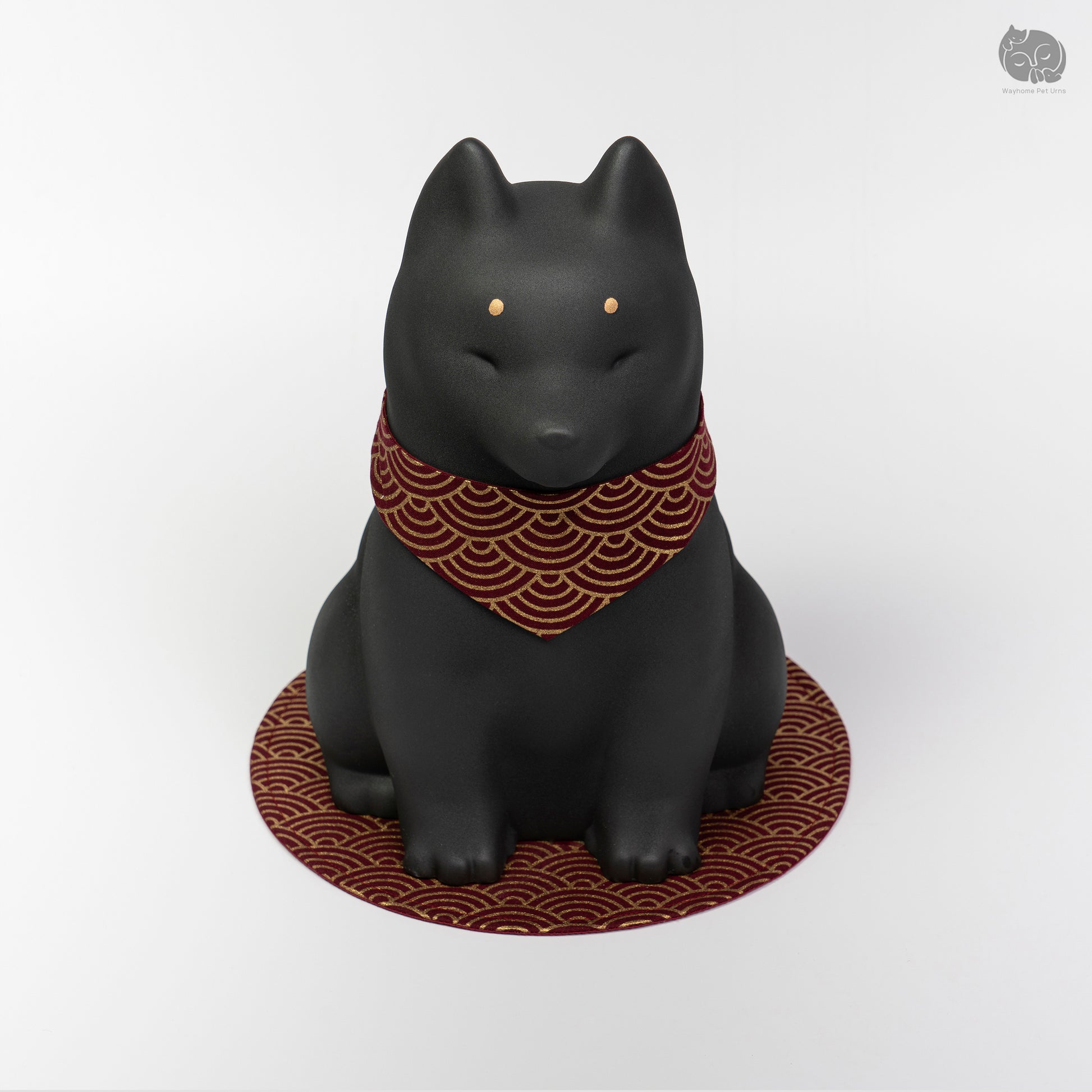 Front angle view of the black ceramic dog urn on a red mat, perfect for a memorial altar for a Shiba Inu.