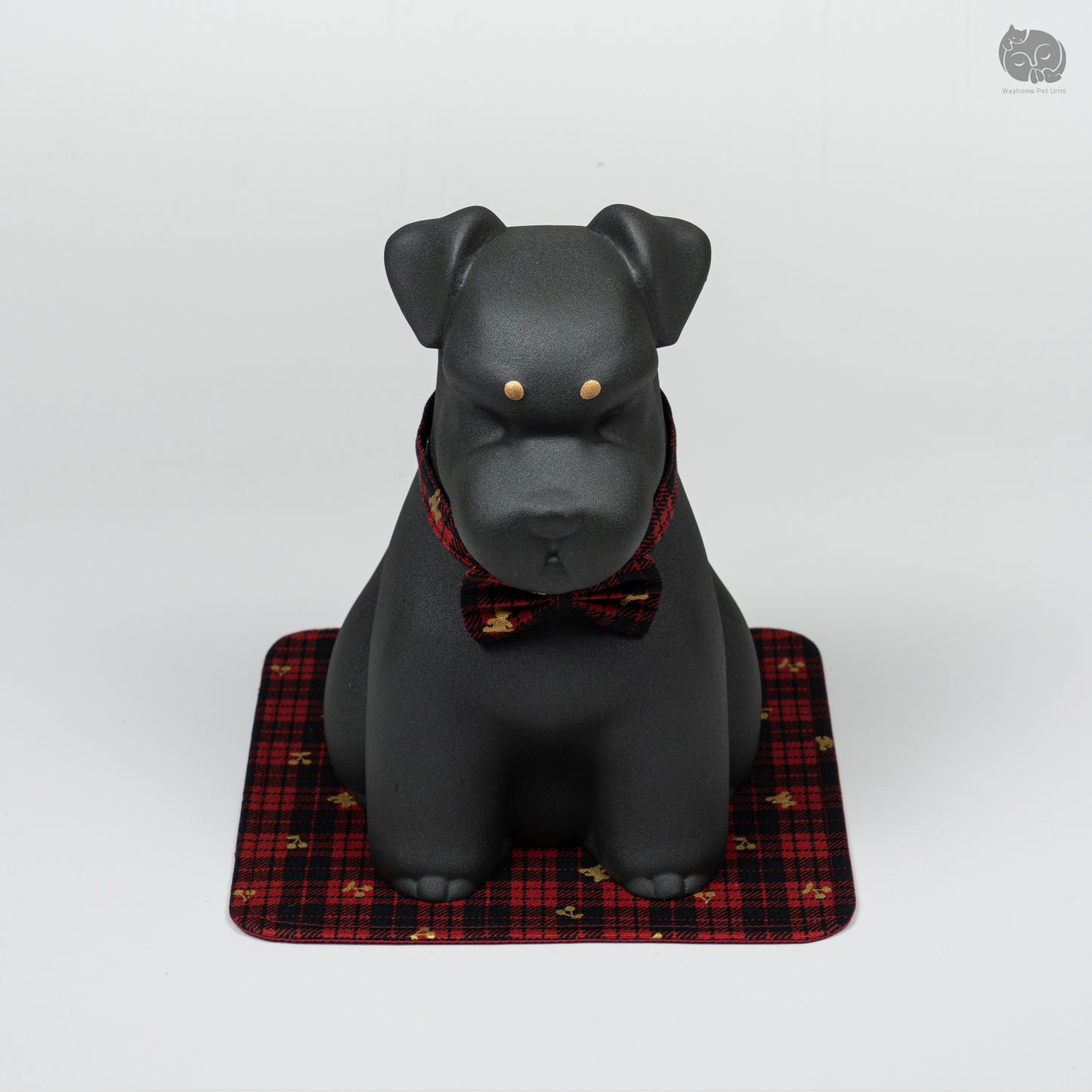 Direct front view of the Wayhome black Terrier ceramic urn on its signature mat, showcasing the artistic pet tribute.