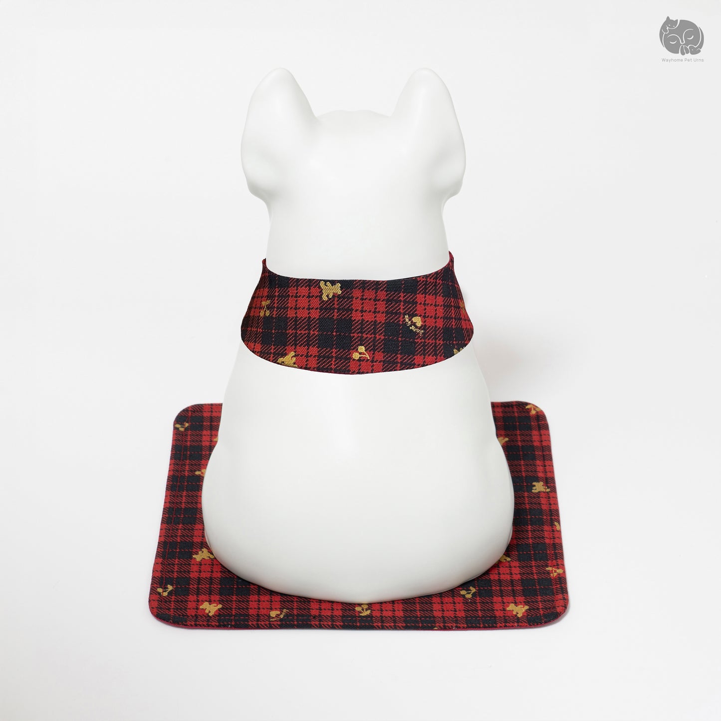 Angled back view of the white dog ashes keepsake, highlighting the sturdy base and decorative mat.