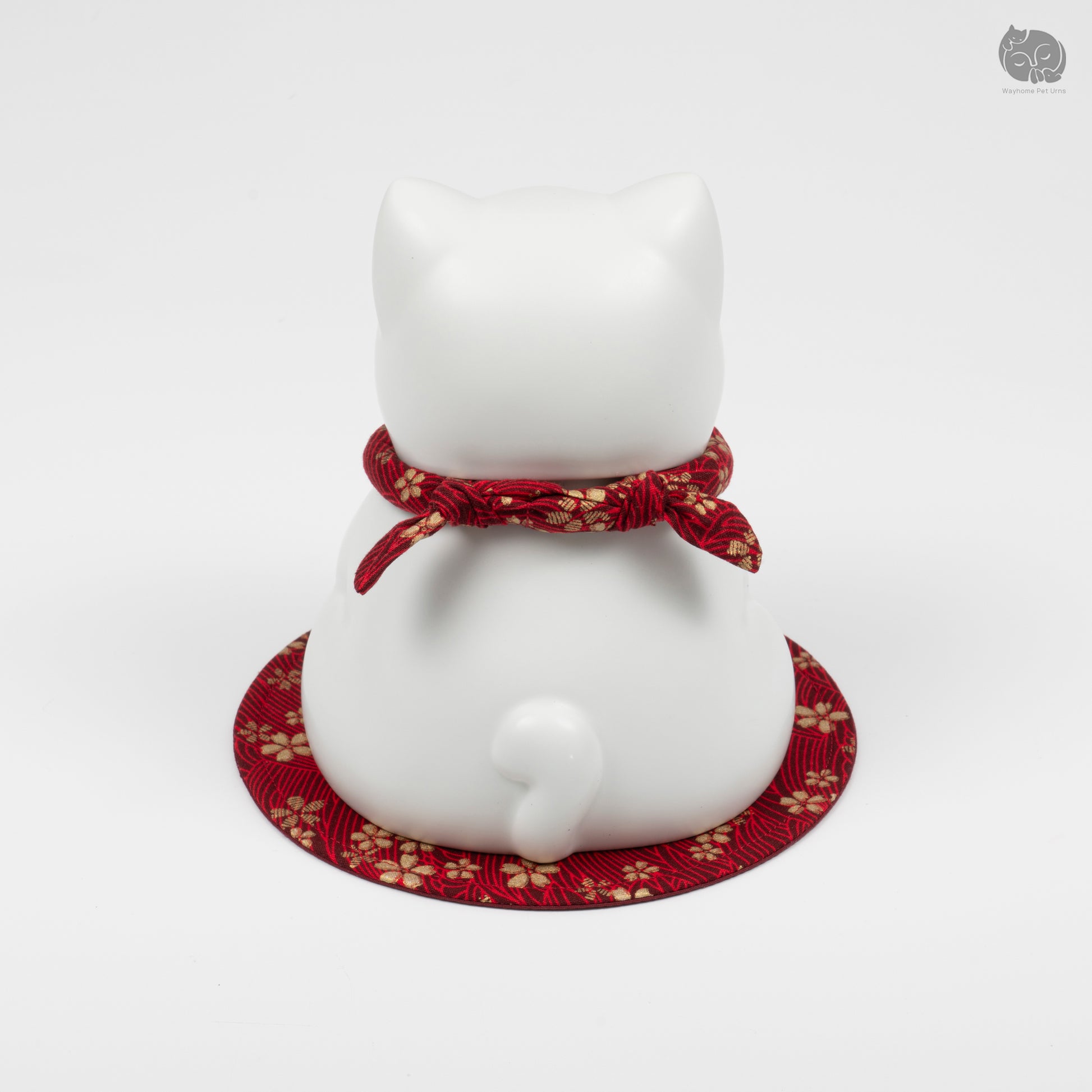 Rear view of the cat ceramic urn, showing the cute tail detail and secure handcrafted ceramic base.