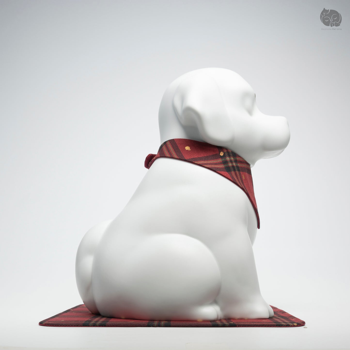 Side profile of the handcrafted white ceramic dog memorial jar, showing its elegant and sturdy silhouette.