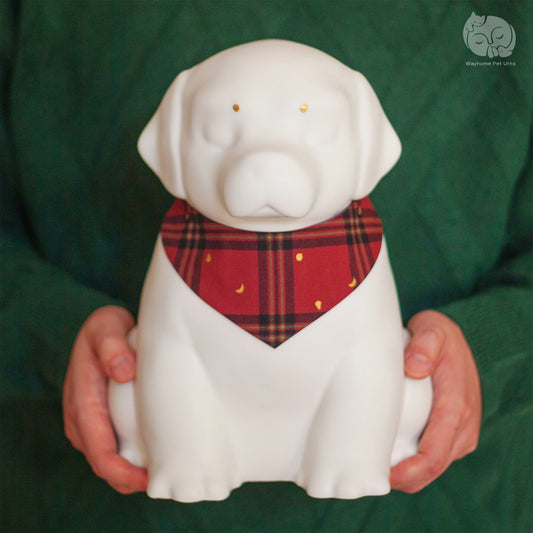 Wayhome ivory white ceramic dog urn for Labrador, held in hands to show actual size for large breeds.
