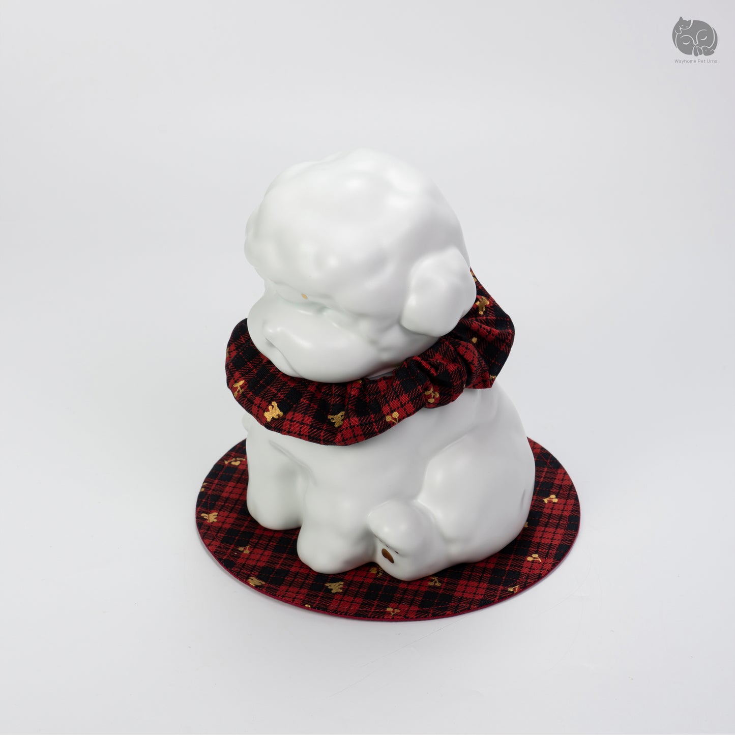 Front quarter angle of the Wayhome ivory white poodle urn, a beautiful memorial keepsake for small dogs.