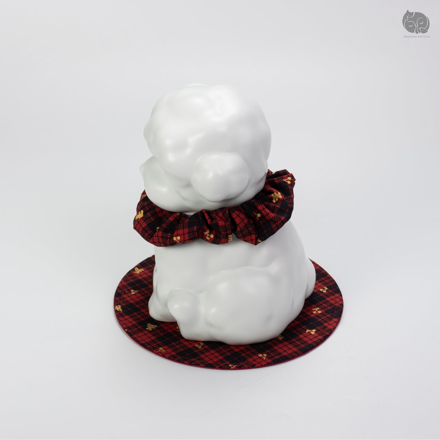 Angled side view of the white ceramic dog urn, showcasing the minimalist sculpture for Teddy and Poodle.